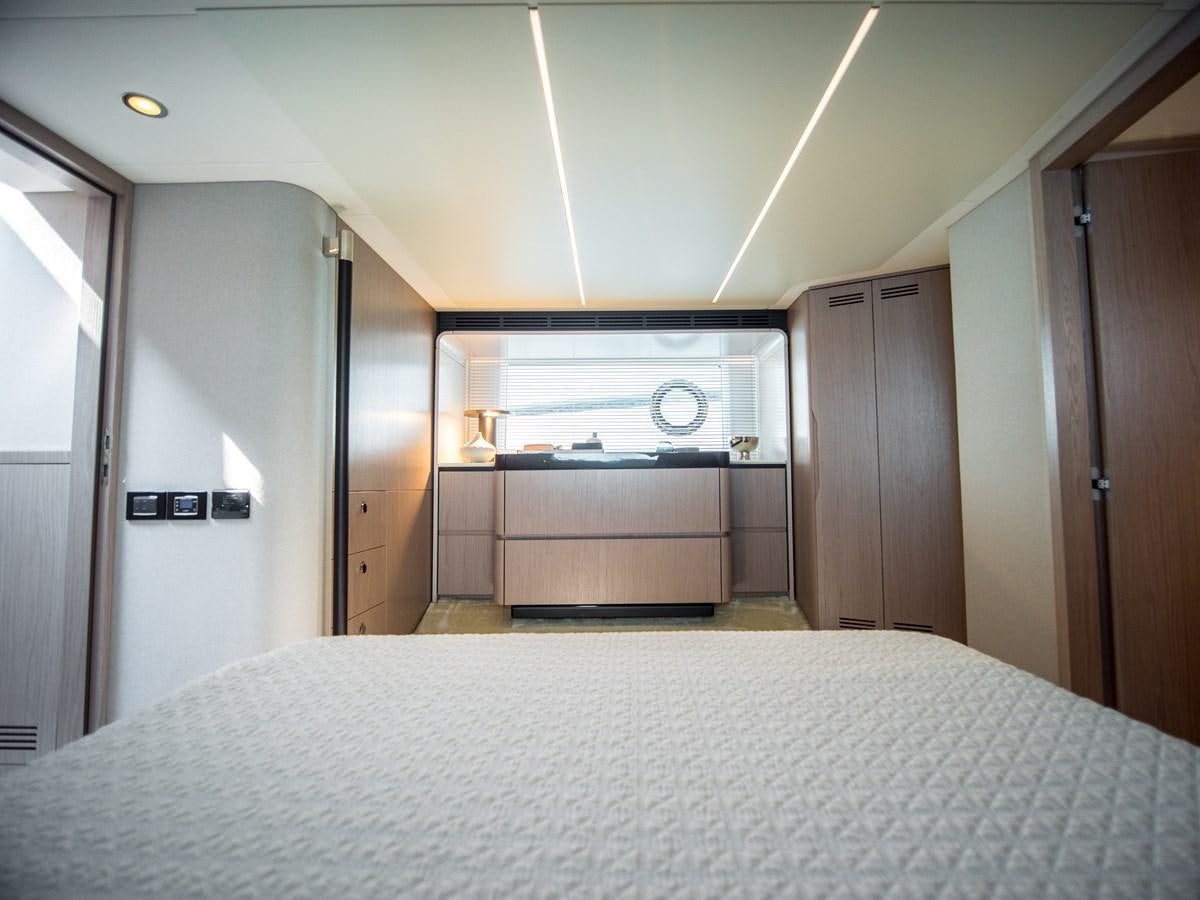 a bed in a room aboard EVADO Yacht for Sale