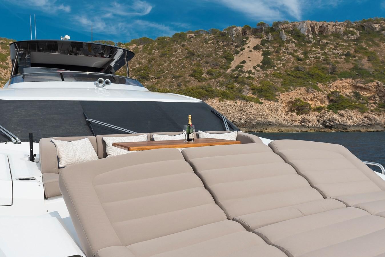 a boat with a bottle on it aboard AFTER 8 II Yacht for Sale