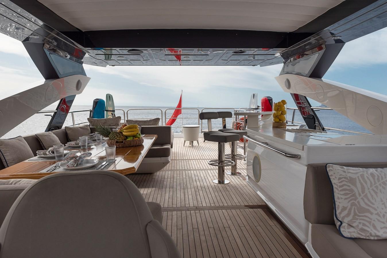 a boat with a table and chairs aboard AFTER 8 II Yacht for Sale