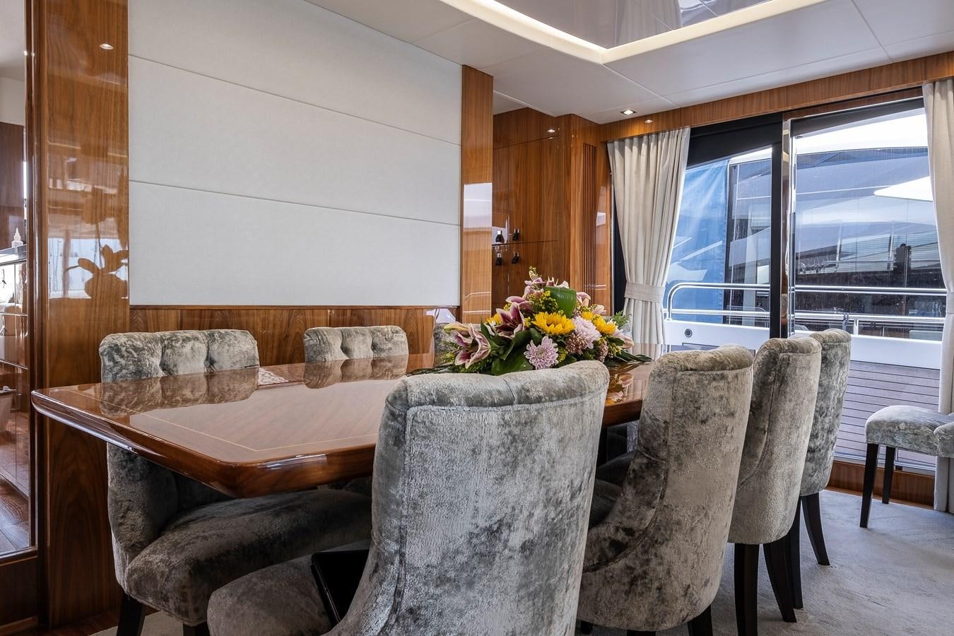 a living room with a couch and chairs aboard AFTER 8 II Yacht for Sale