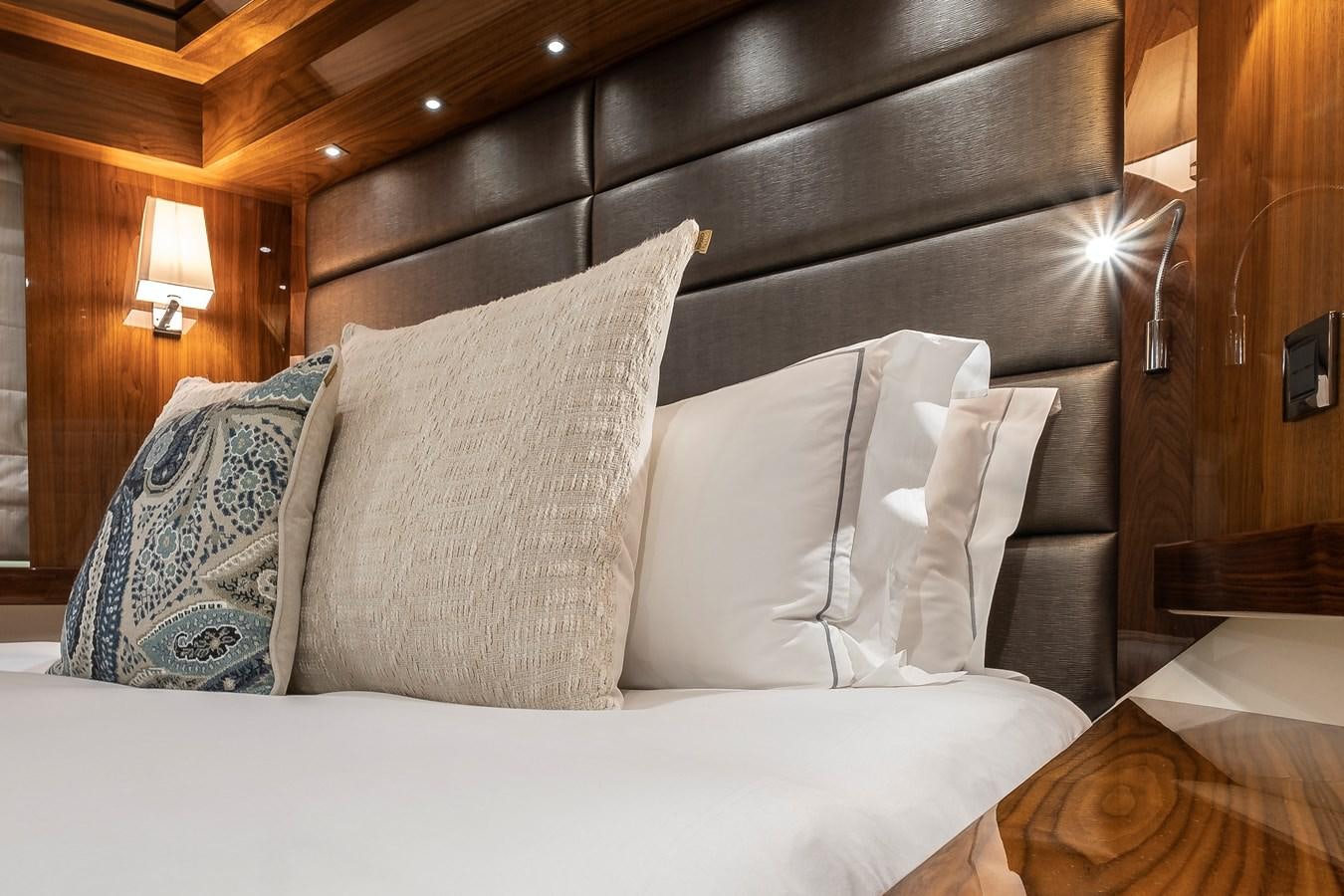 a bed with pillows aboard AFTER 8 II Yacht for Sale