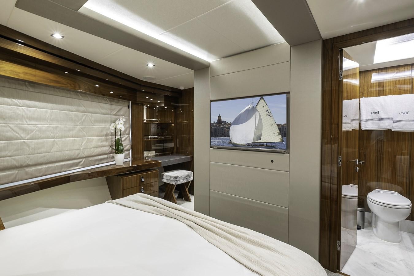 a bathroom with a large mirror aboard AFTER 8 II Yacht for Sale