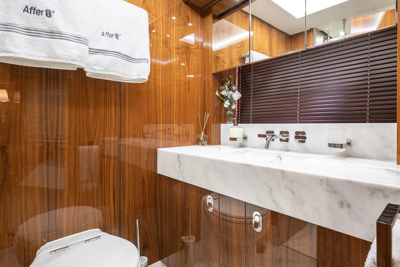 a kitchen with a sink and cabinets aboard AFTER 8 II Yacht for Sale