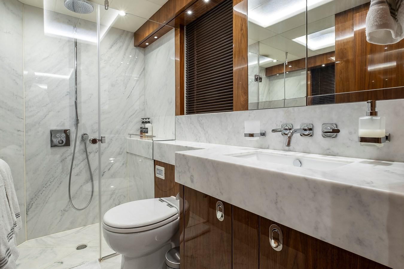 a bathroom with a sink toilet and a bathtub aboard AFTER 8 II Yacht for Sale
