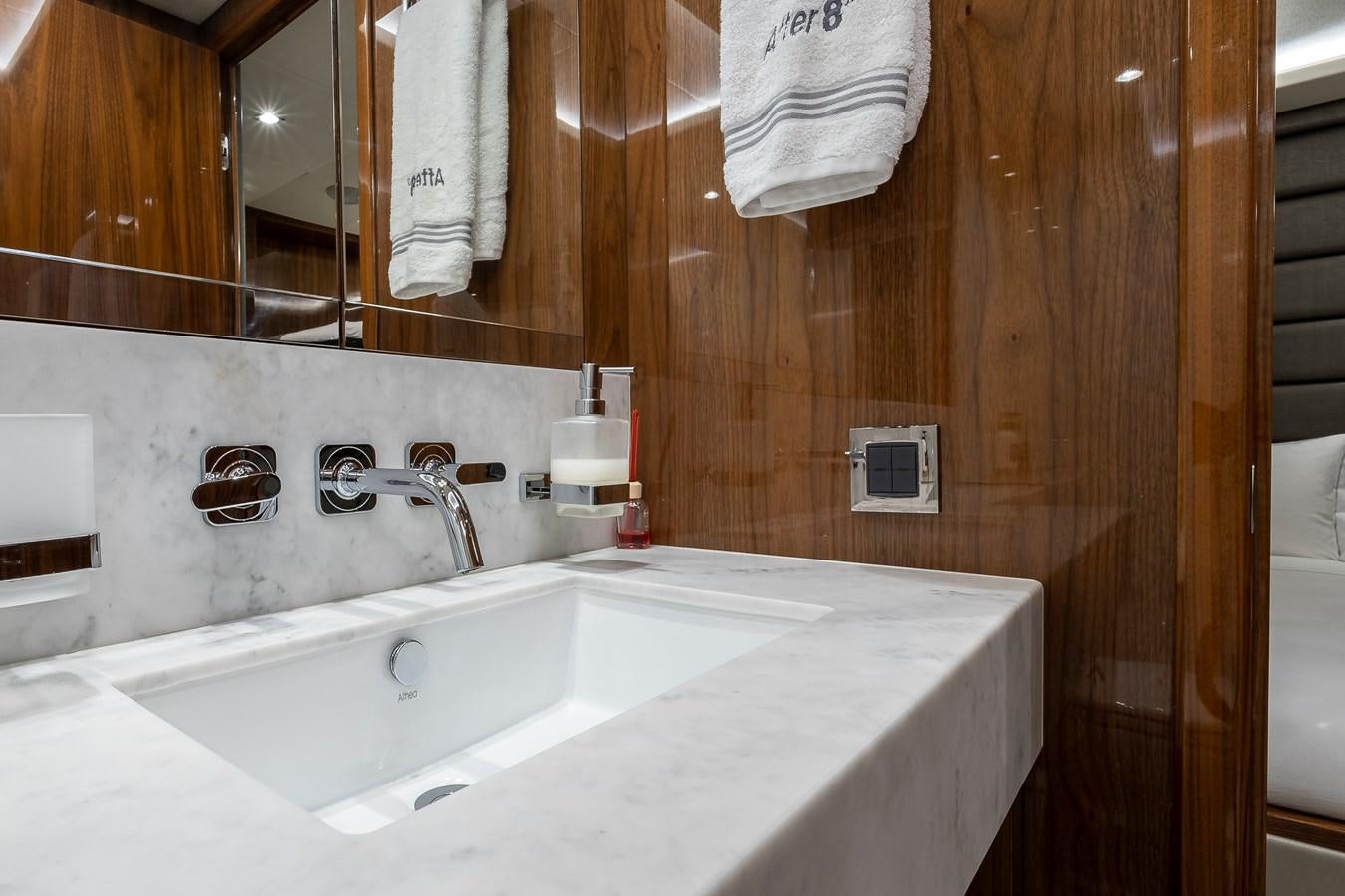 a bathroom with a bathtub and sink aboard AFTER 8 II Yacht for Sale