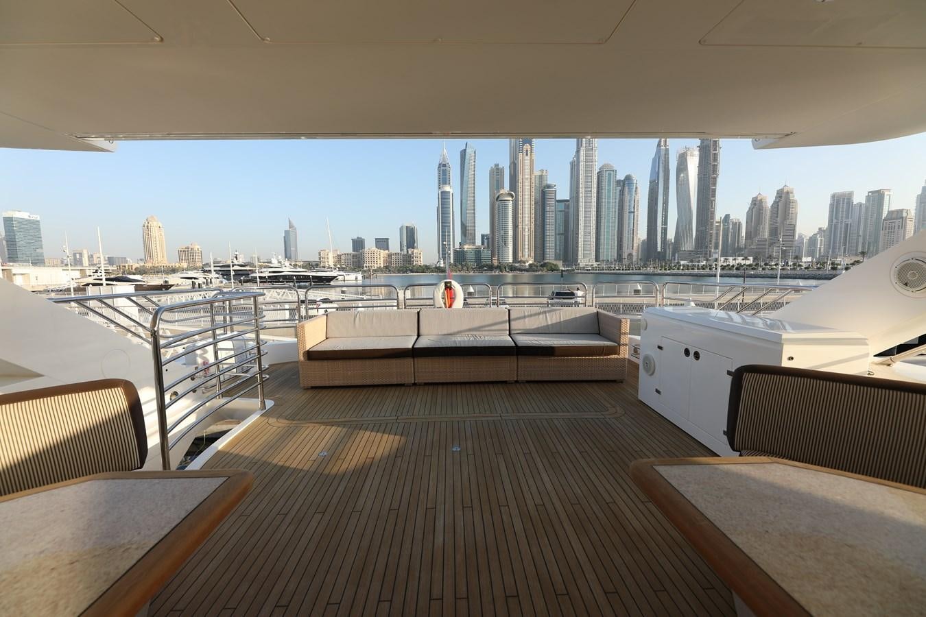 a room with a view of a city aboard SUNSEEKER 30M Yacht for Sale