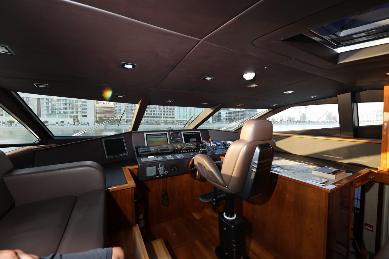 a room with a desk and chairs aboard SUNSEEKER 30M Yacht for Sale