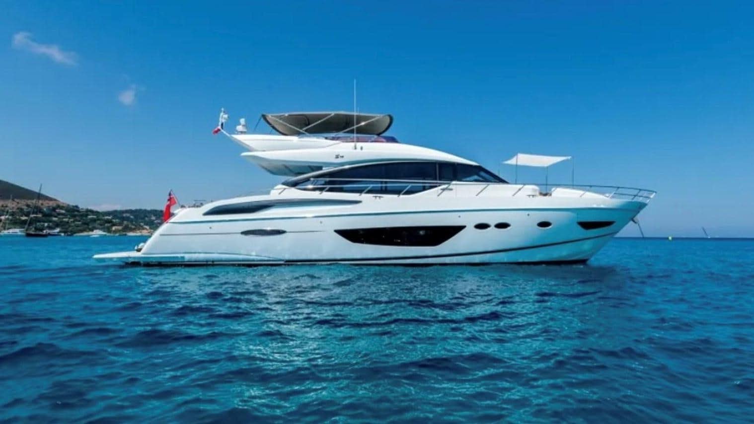 a white yacht in the water aboard PRINCESS S72 Yacht for Sale