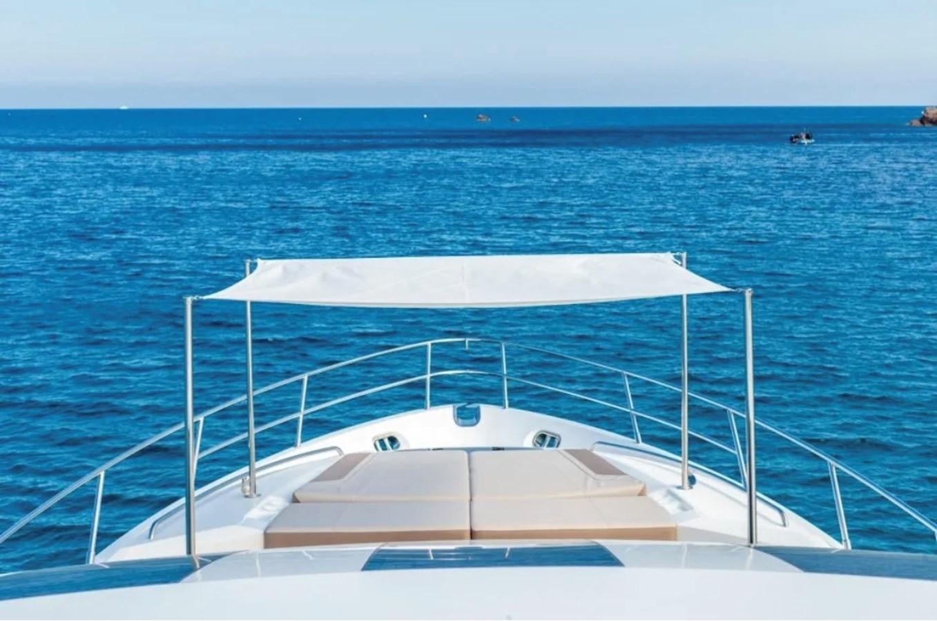 a boat on the water aboard PRINCESS S72 Yacht for Sale