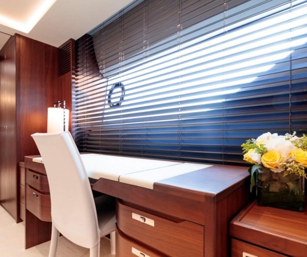 a room with a desk and a chair aboard PRINCESS S72 Yacht for Sale