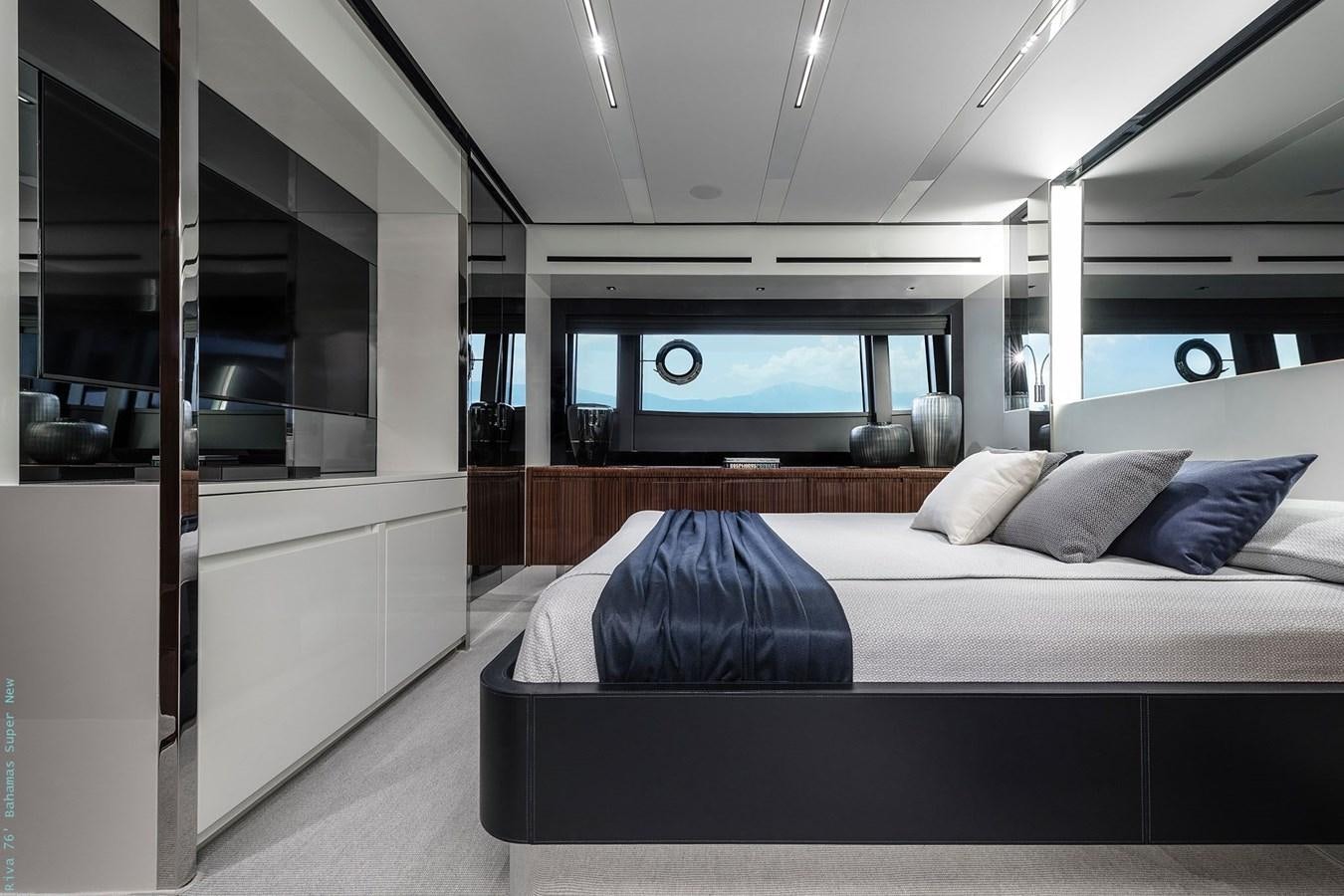 a bed in a room aboard RIVA 76 BAHAMAS SUPER  Yacht for Sale