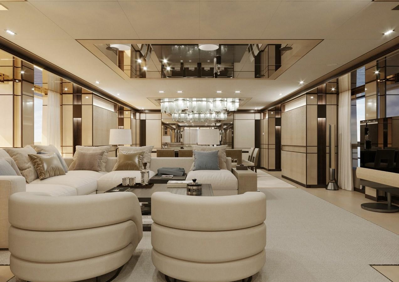 a large room with white furniture aboard RELIANCE Yacht for Sale