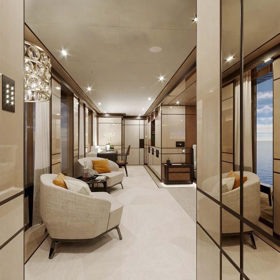 a room with a couch and a mirror aboard RELIANCE Yacht for Sale