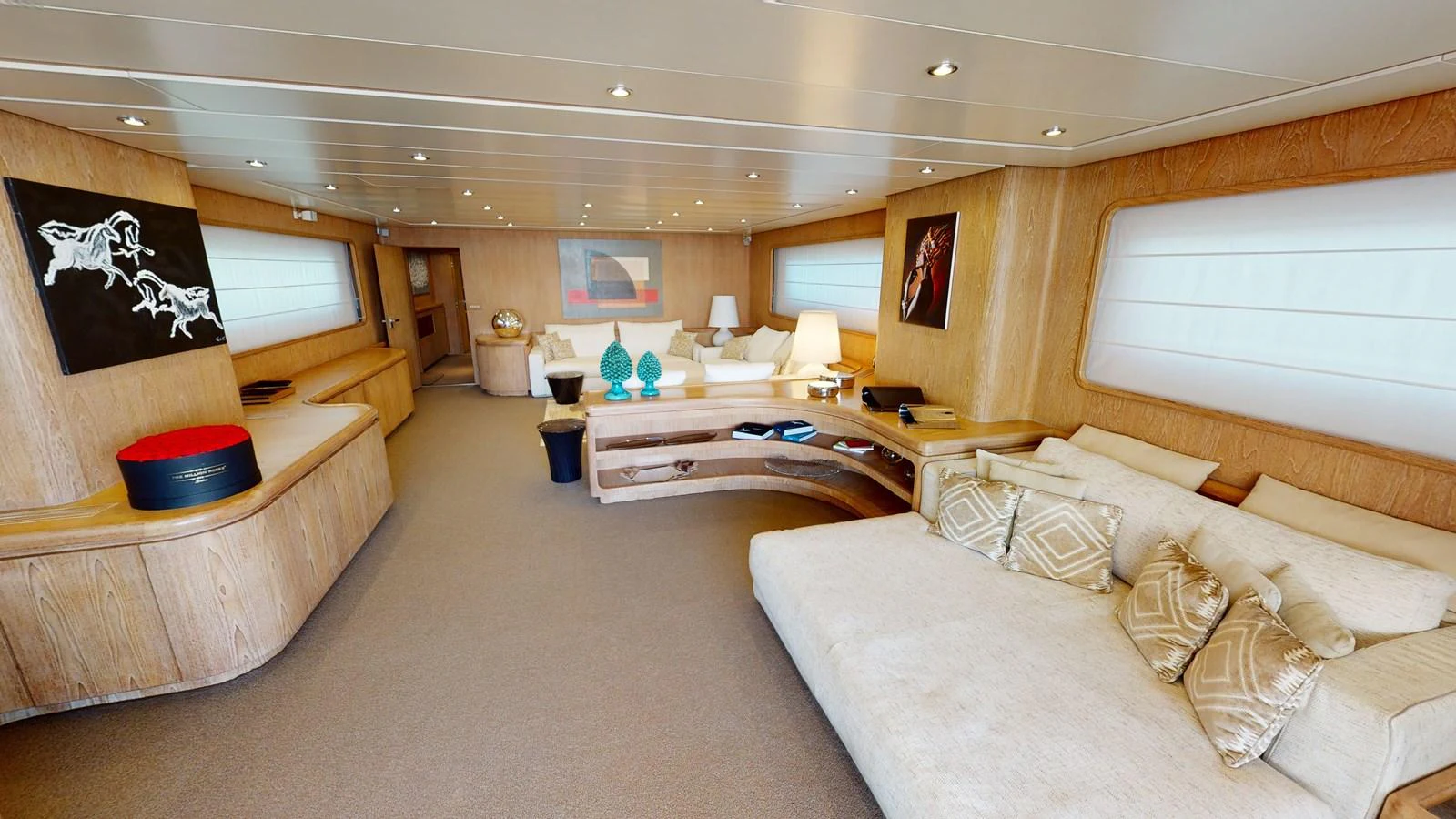 a room with a couch and a bed aboard IXIA Yacht for Sale