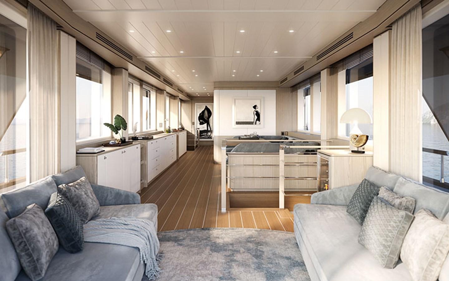 a living room with a couch and a coffee table aboard AF Yacht for Sale