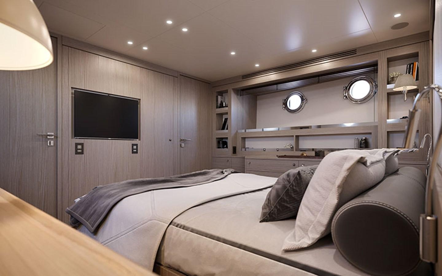 a bedroom with a bed and a television aboard AF Yacht for Sale