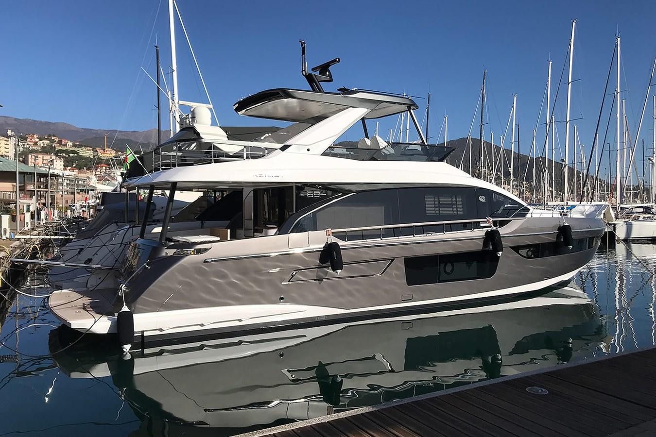 a boat with a helicopter on top aboard SUNSTROKE Yacht for Sale