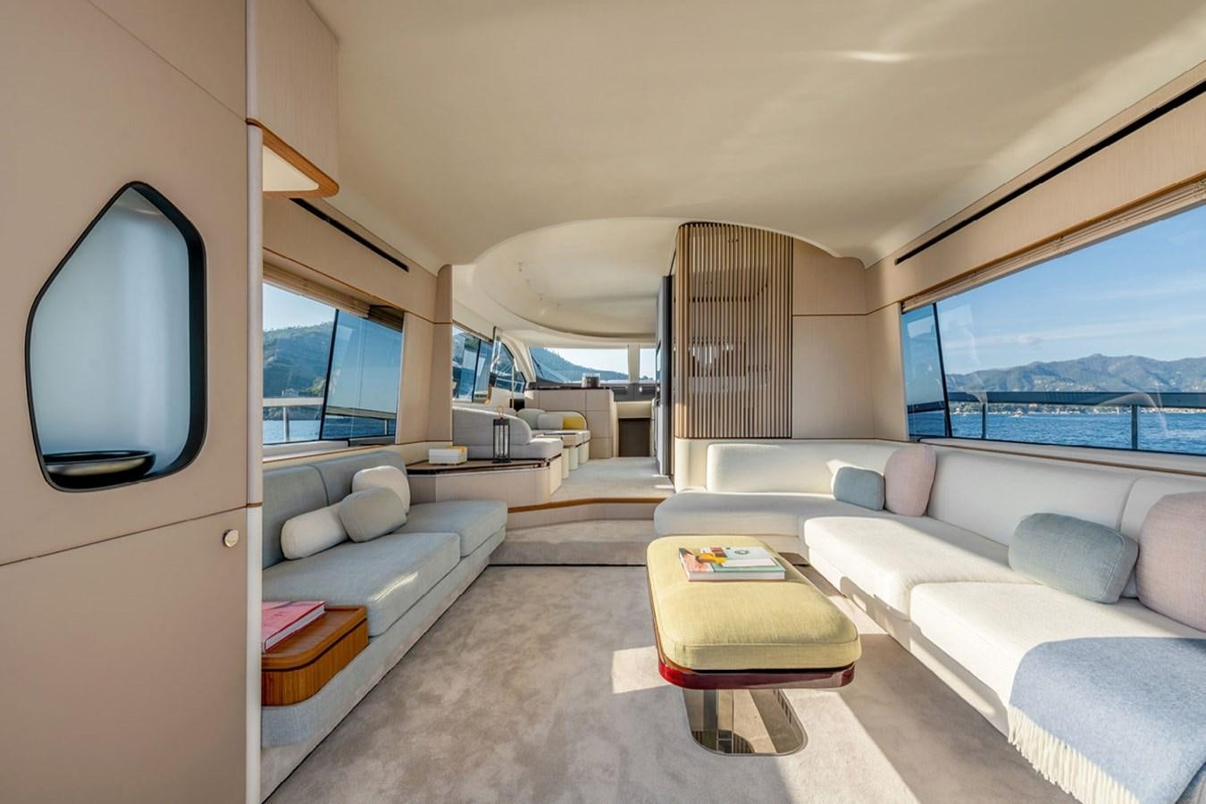 a living room with a large window aboard SUNSTROKE Yacht for Sale