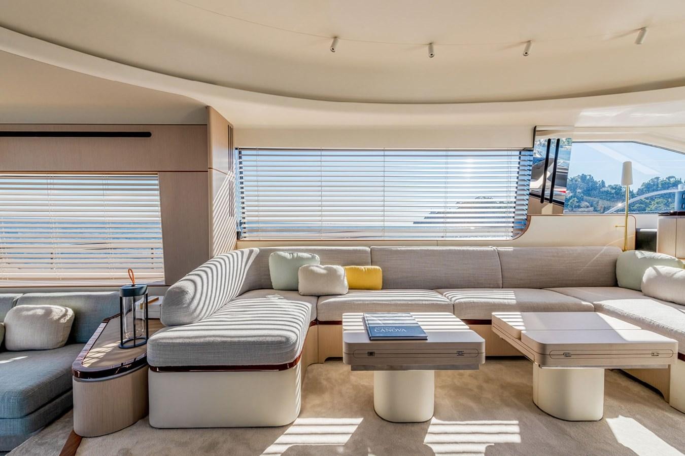 a living room with a couch and a table aboard SUNSTROKE Yacht for Sale