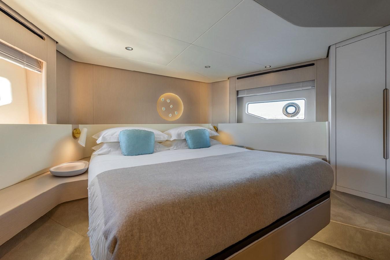 a bed in a room aboard SUNSTROKE Yacht for Sale