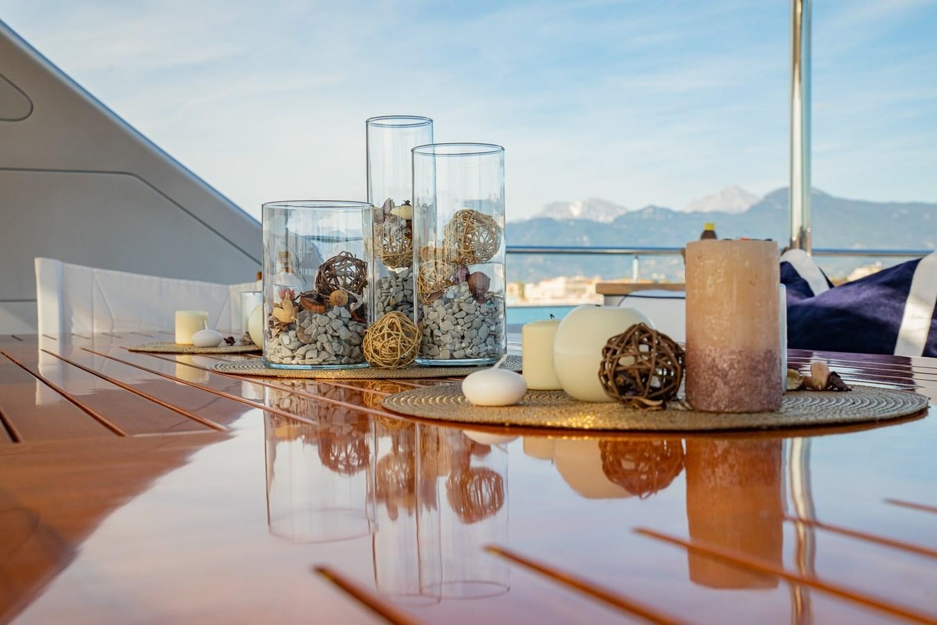 a table with food and glasses aboard HATT MILL Yacht for Charter