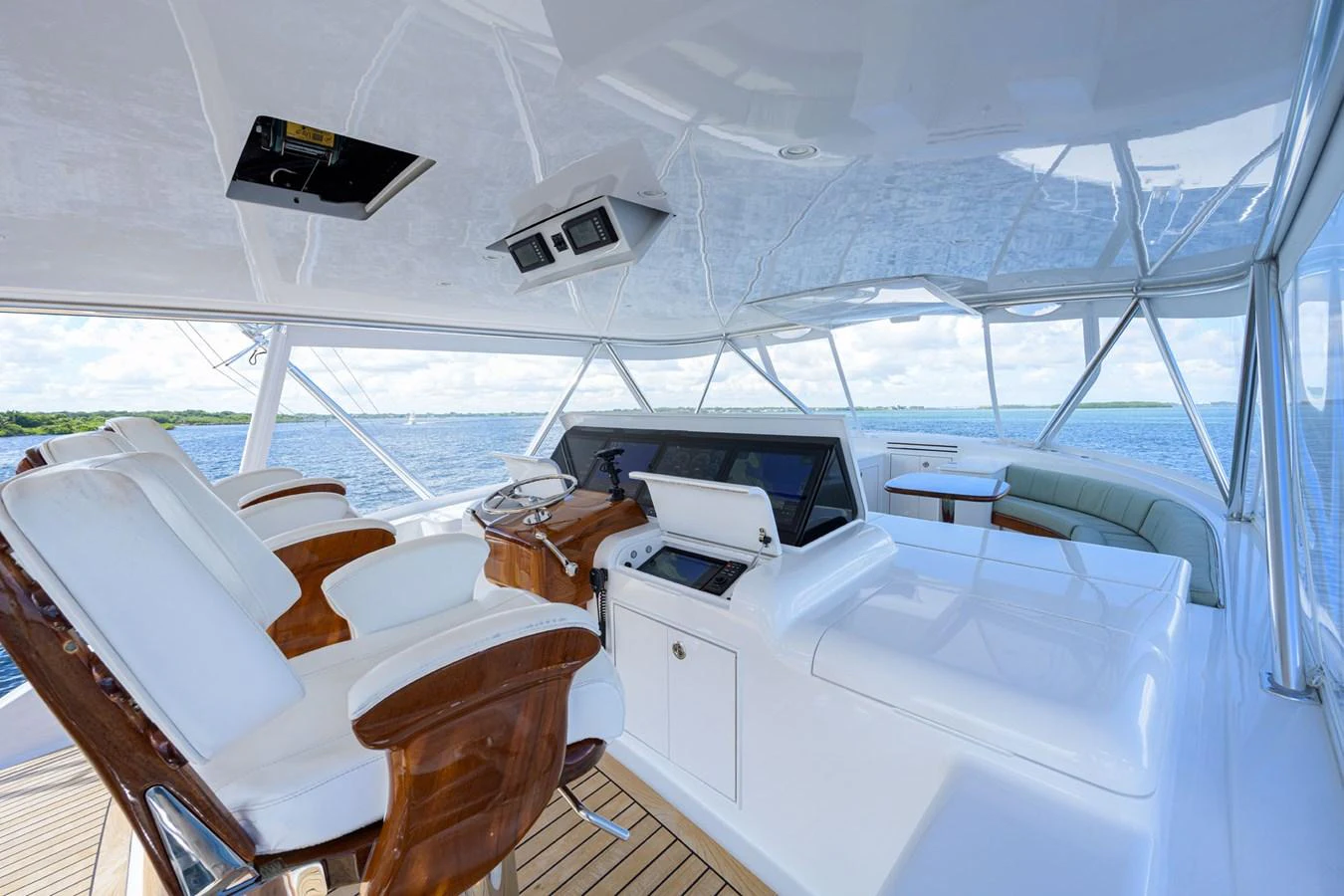 a boat with white furniture aboard GEORGIA GIRL Yacht for Sale