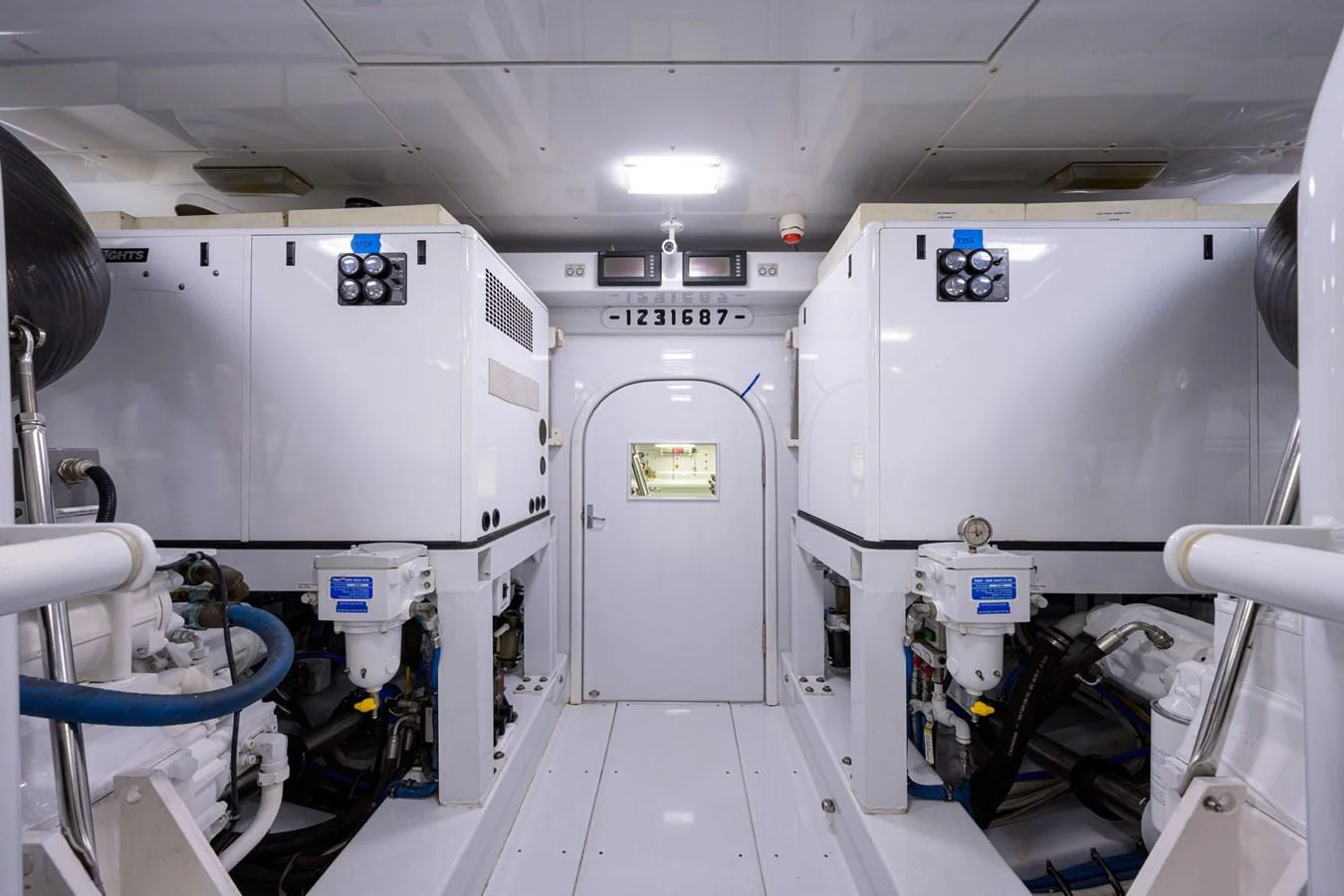 a room with white machines aboard GEORGIA GIRL Yacht for Sale