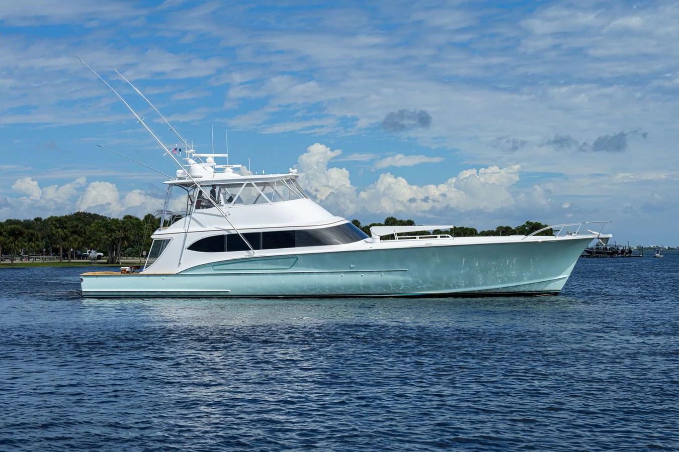 a white boat on the water aboard GEORGIA GIRL Yacht for Sale