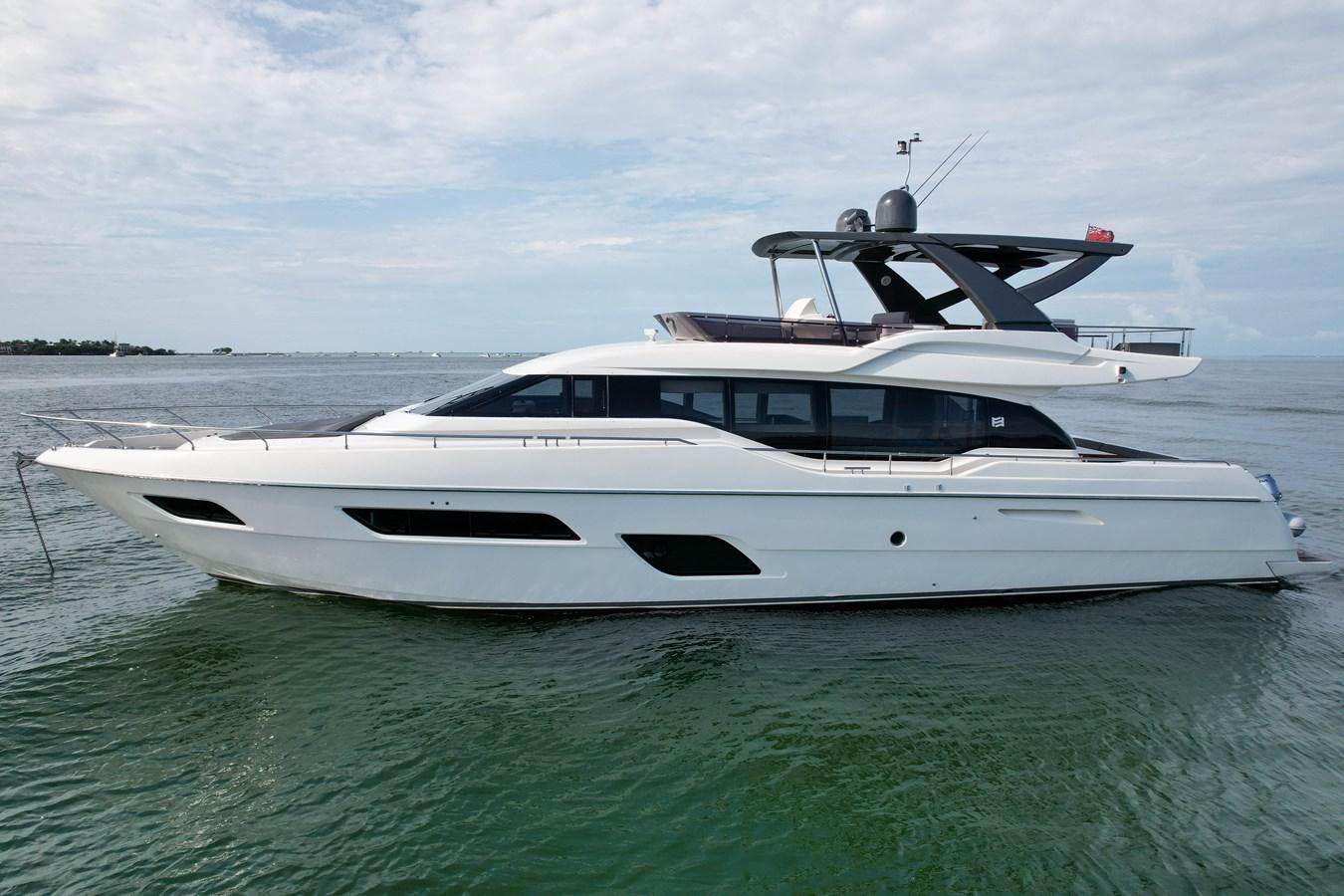 a white boat in the water aboard G3 Yacht for Sale