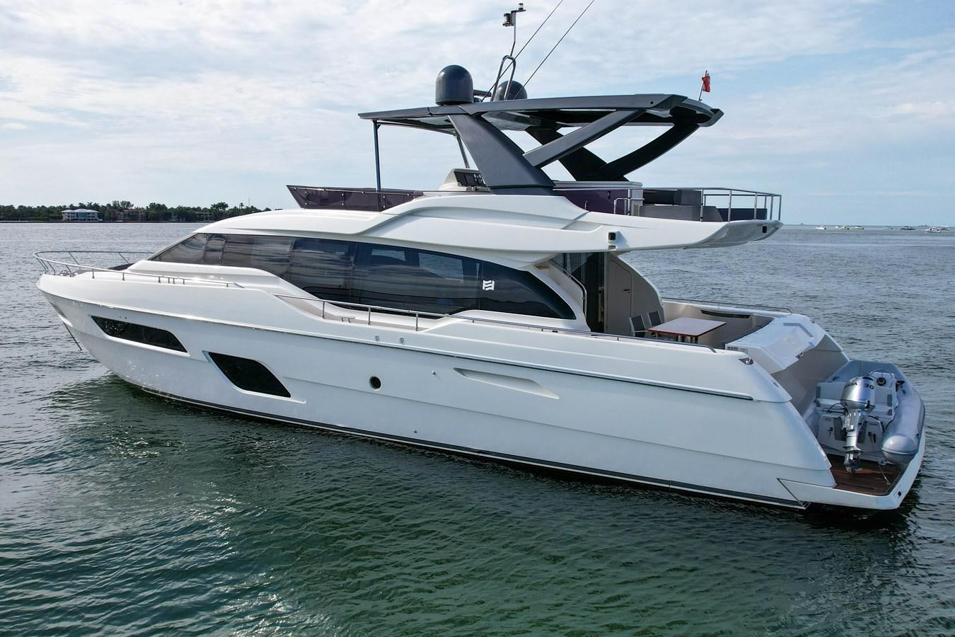 a white yacht on the water aboard G3 Yacht for Sale