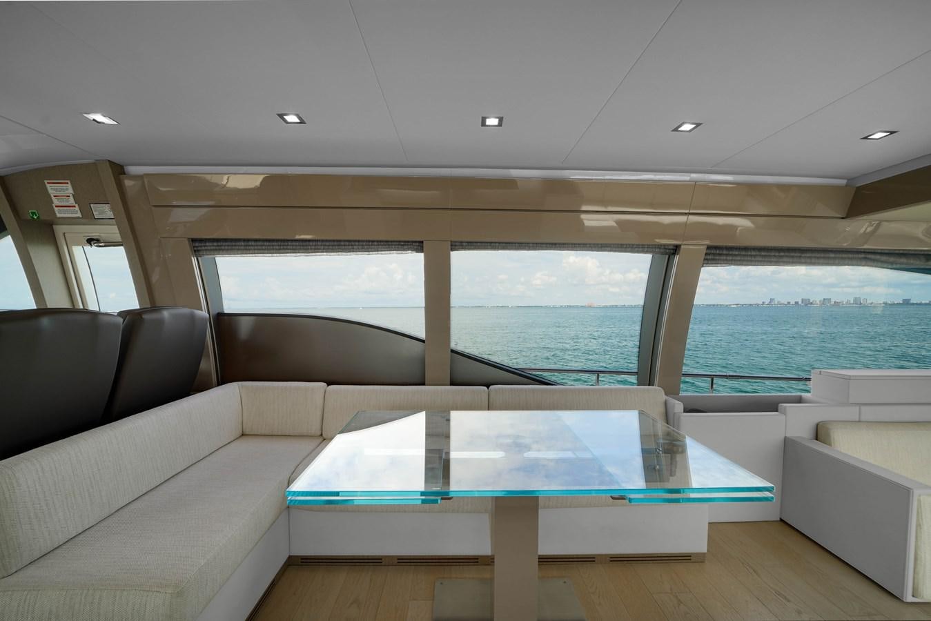 a room with a couch and a pool aboard G3 Yacht for Sale