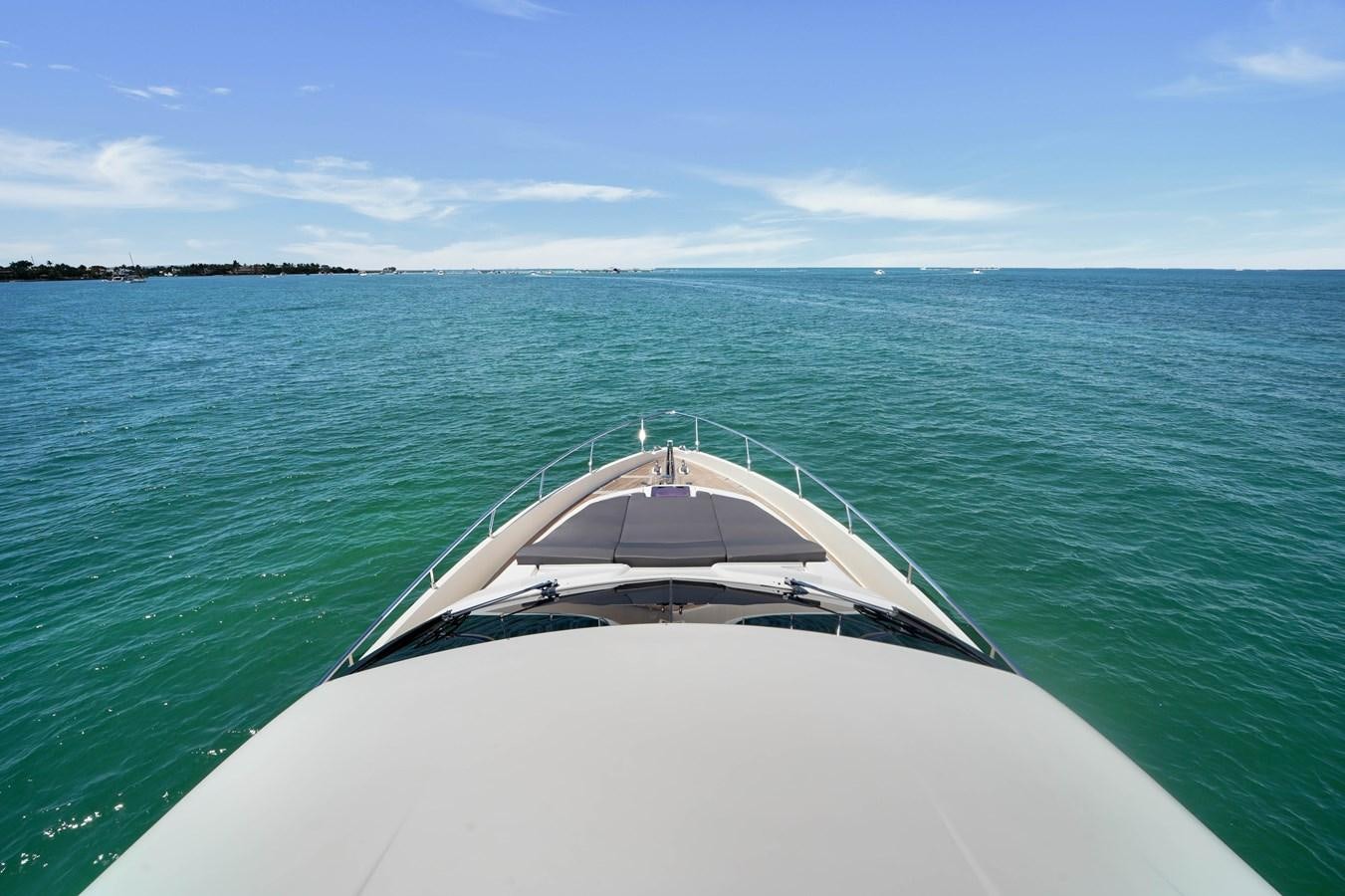 a white boat in the water aboard G3 Yacht for Sale