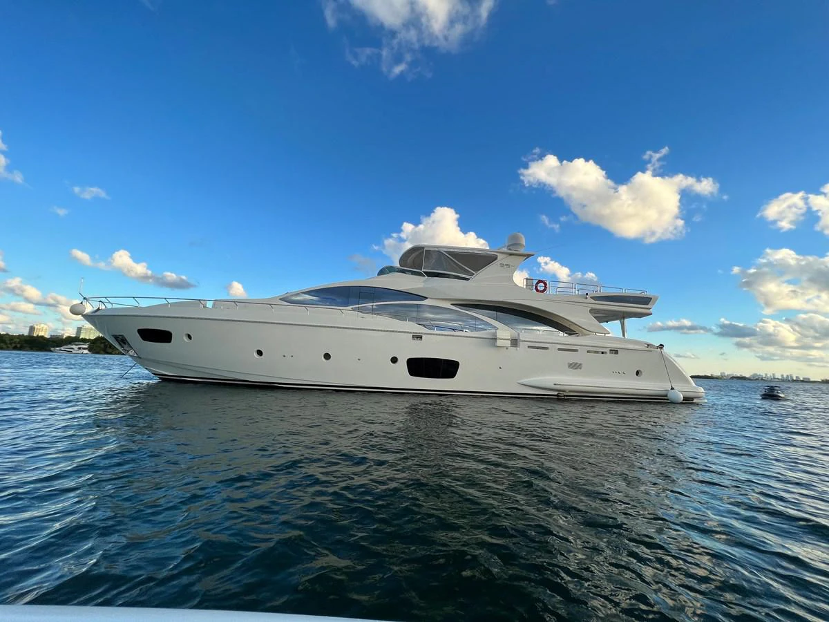 a white yacht on the water aboard BT-2 Yacht for Sale