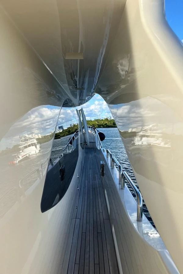 a group of people walking on a bridge aboard BT-2 Yacht for Sale