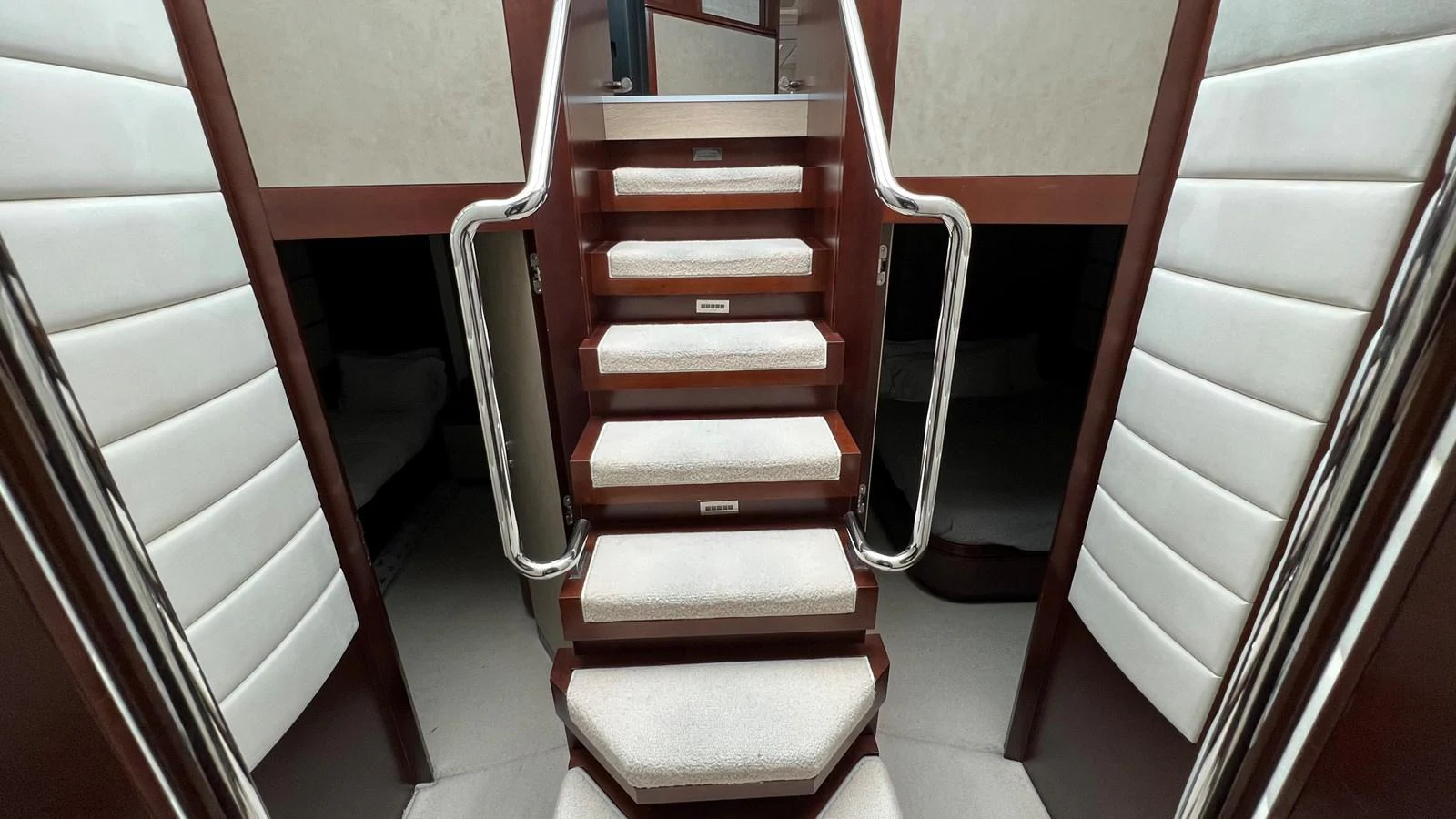 a red and white staircase aboard BT-2 Yacht for Sale