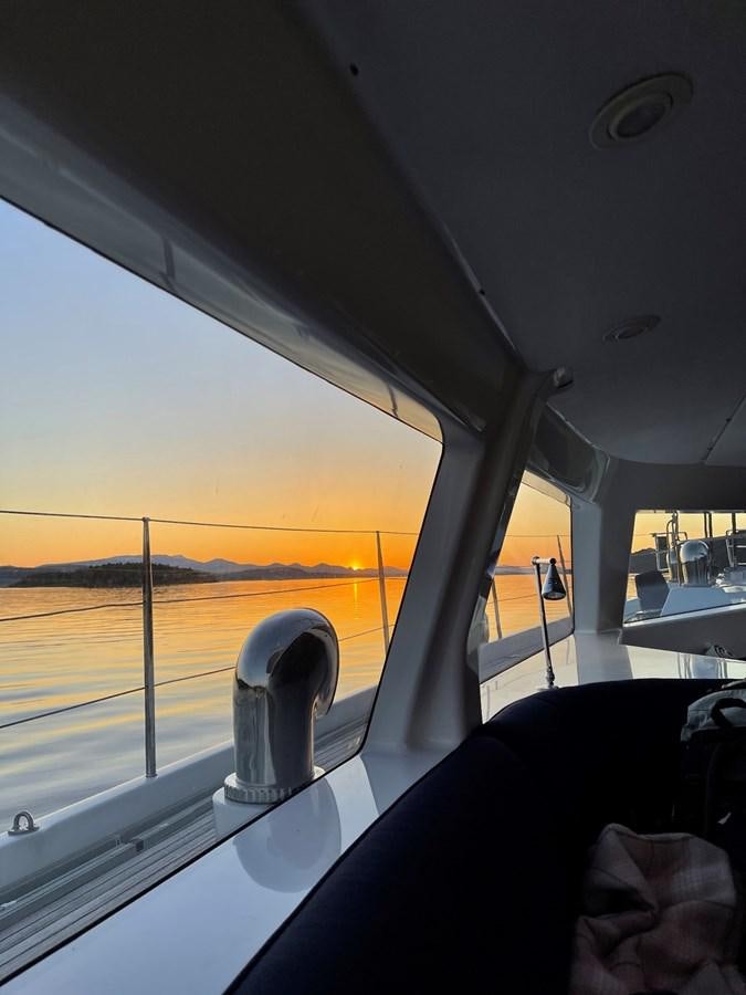a view of the sunset from the inside of a car aboard LEONORE Yacht for Sale