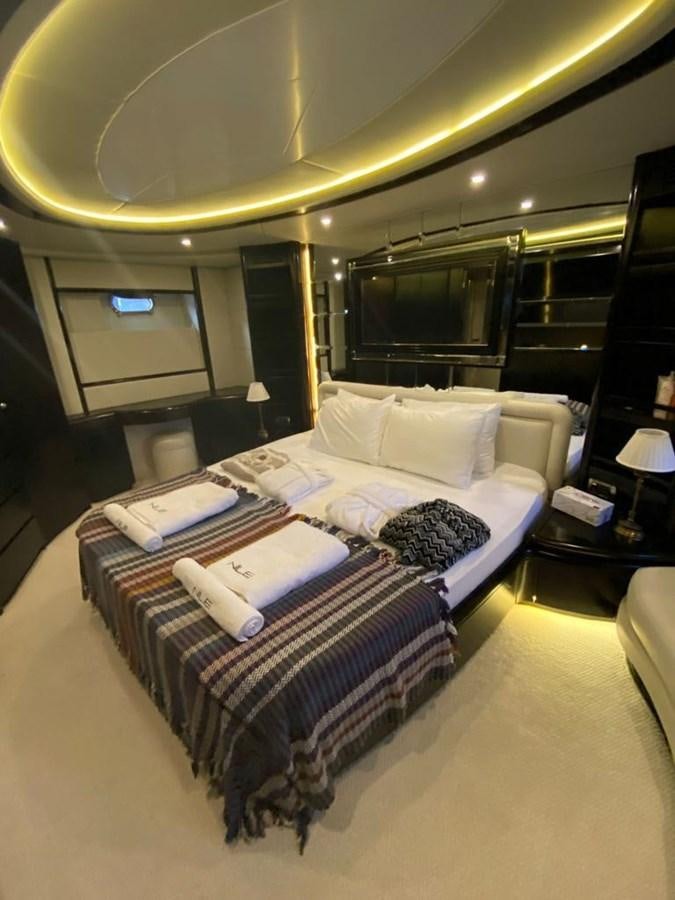 a bed in a hotel room aboard NILE Yacht for Sale