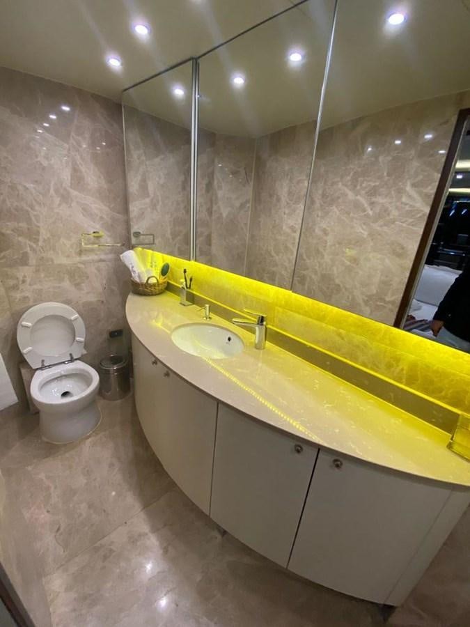 a bathroom with a sink and a toilet aboard NILE Yacht for Sale