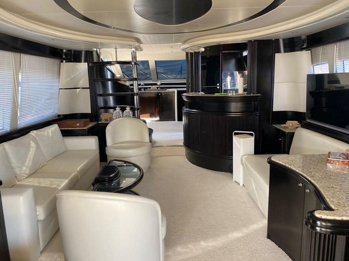 a living room with a large window aboard NILE Yacht for Sale