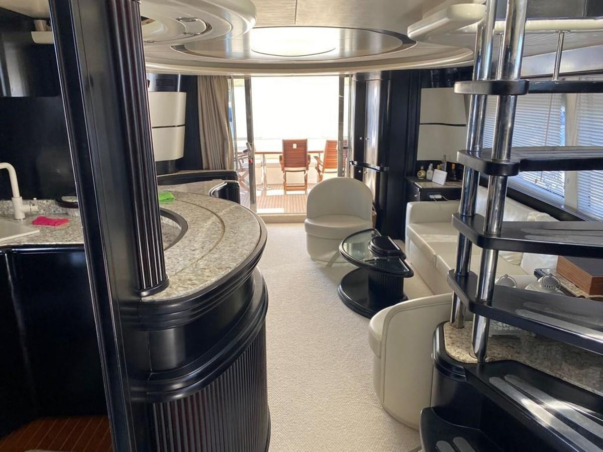 a room with a table and chairs aboard NILE Yacht for Sale