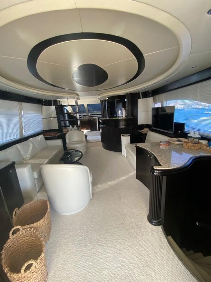 a room with a table and chairs aboard NILE Yacht for Sale
