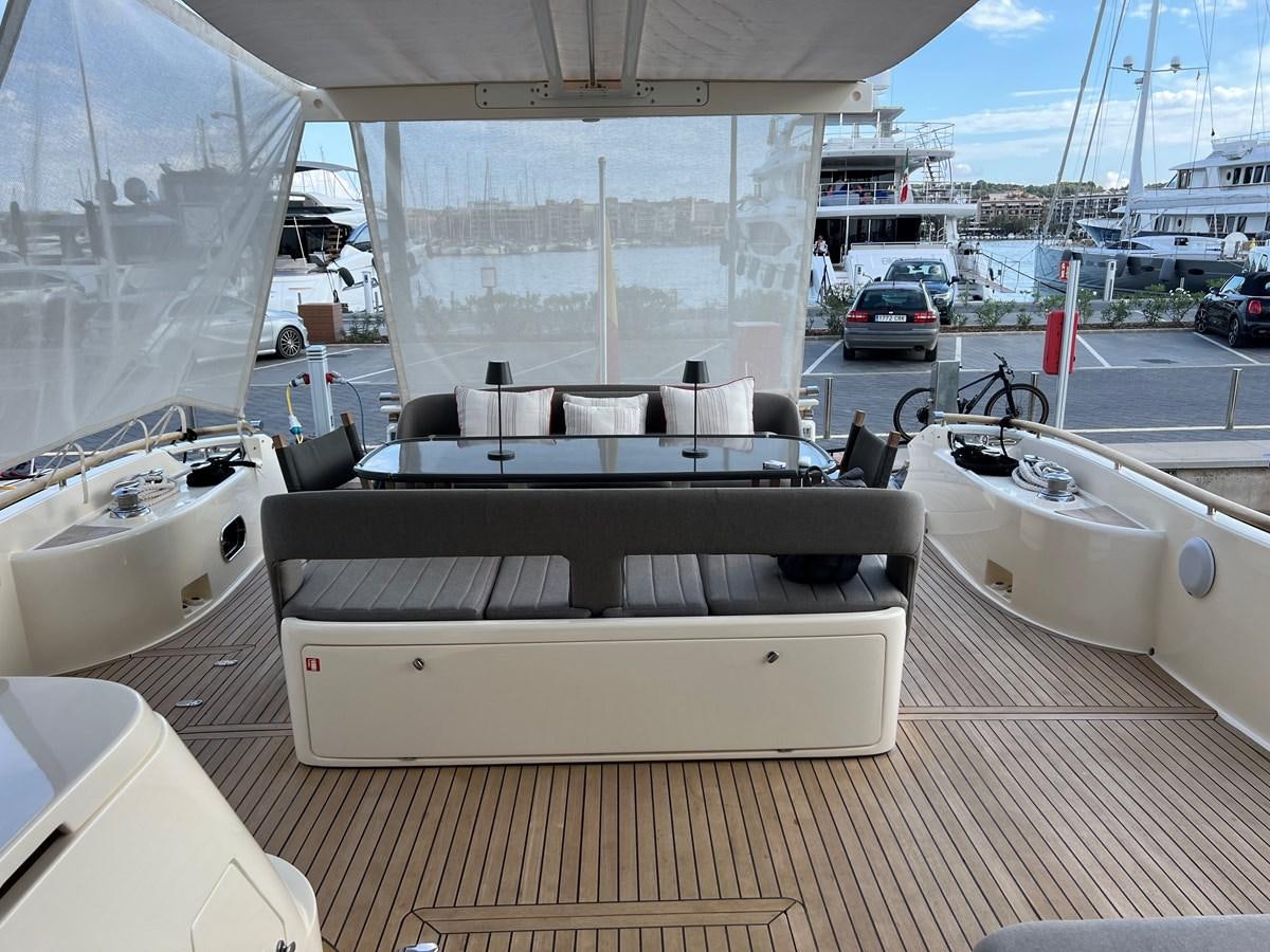 a piano on a deck aboard B Yacht for Sale
