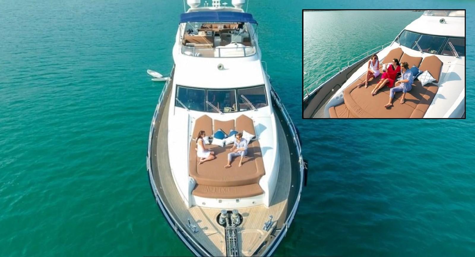 a boat with people on it aboard AEGII Yacht for Sale