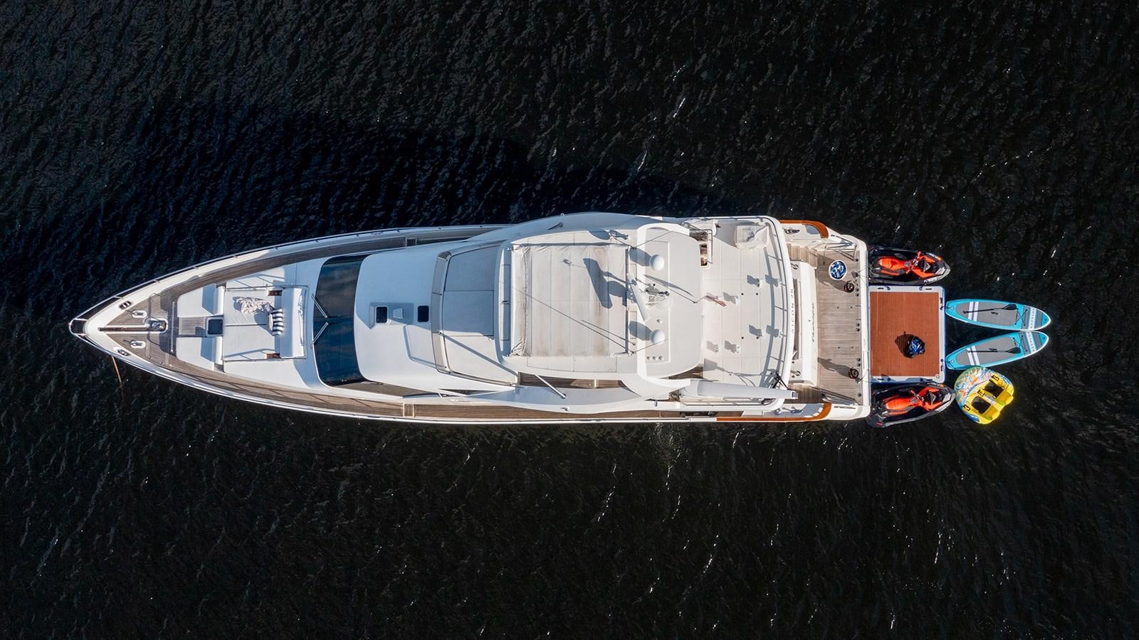a white and orange vehicle aboard THERAPY Yacht for Sale
