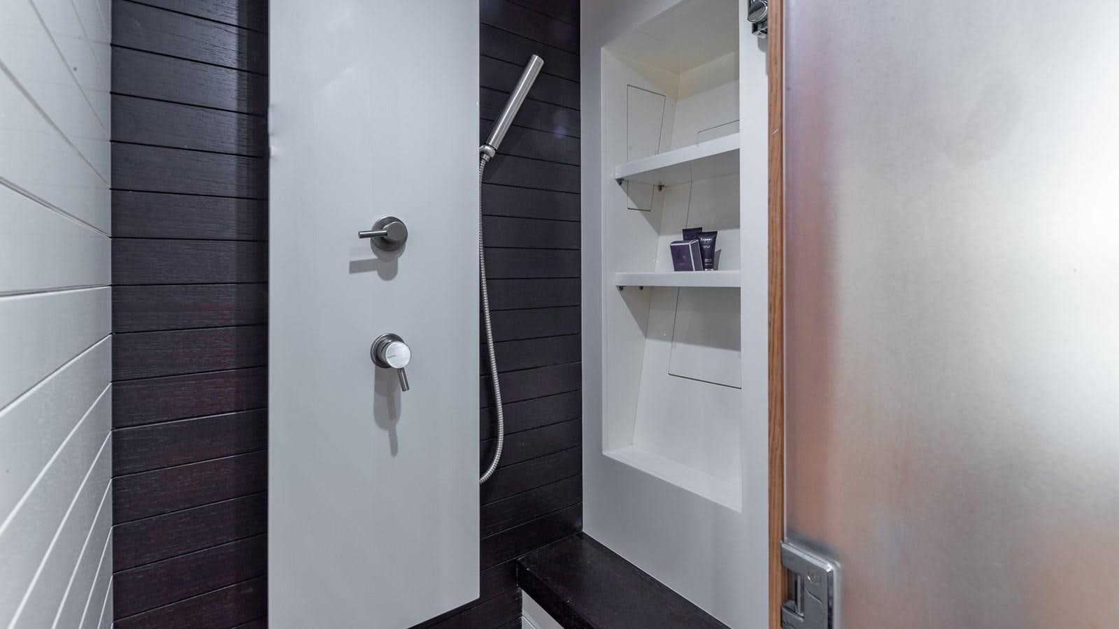 a white door with a handle aboard THERAPY Yacht for Sale