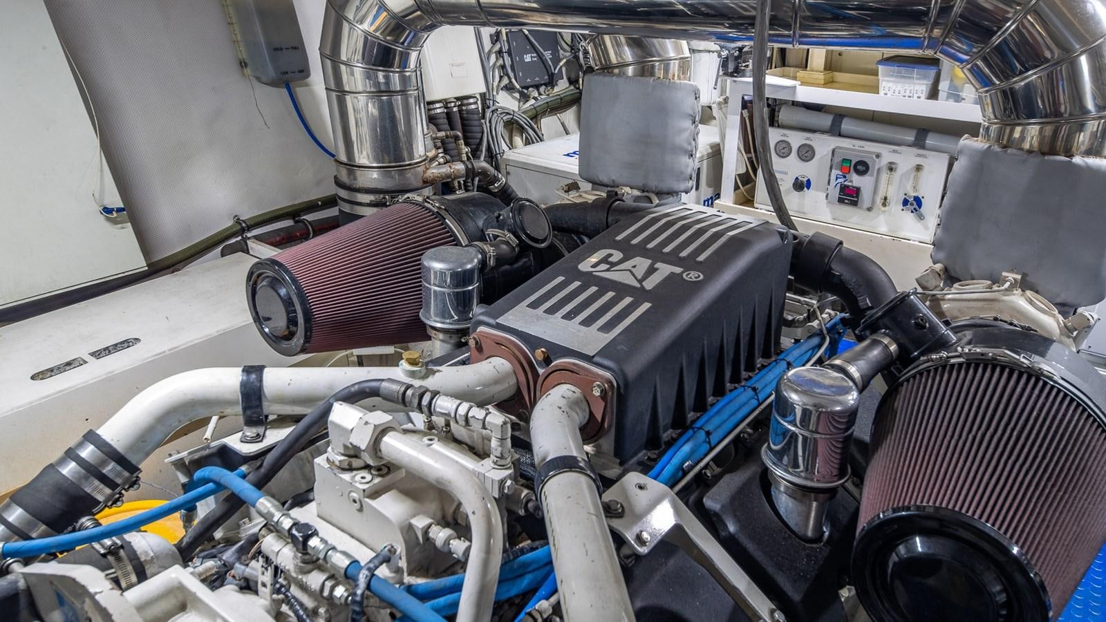 a machine with a large metal cylinder aboard THERAPY Yacht for Sale