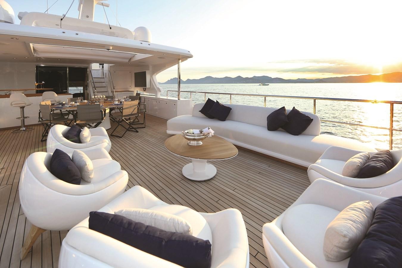a living room with a large white couch and a large window aboard SEANET CO_OWNERSHIP OFFER  Yacht for Sale