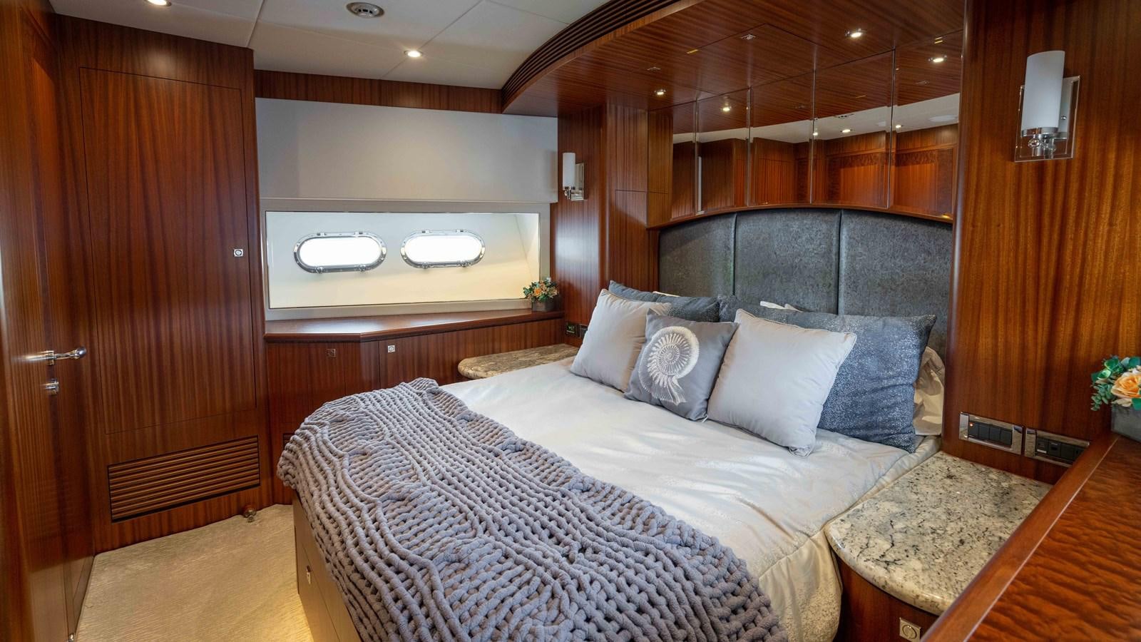 a bed in a room aboard SEA FAIRY Yacht for Sale