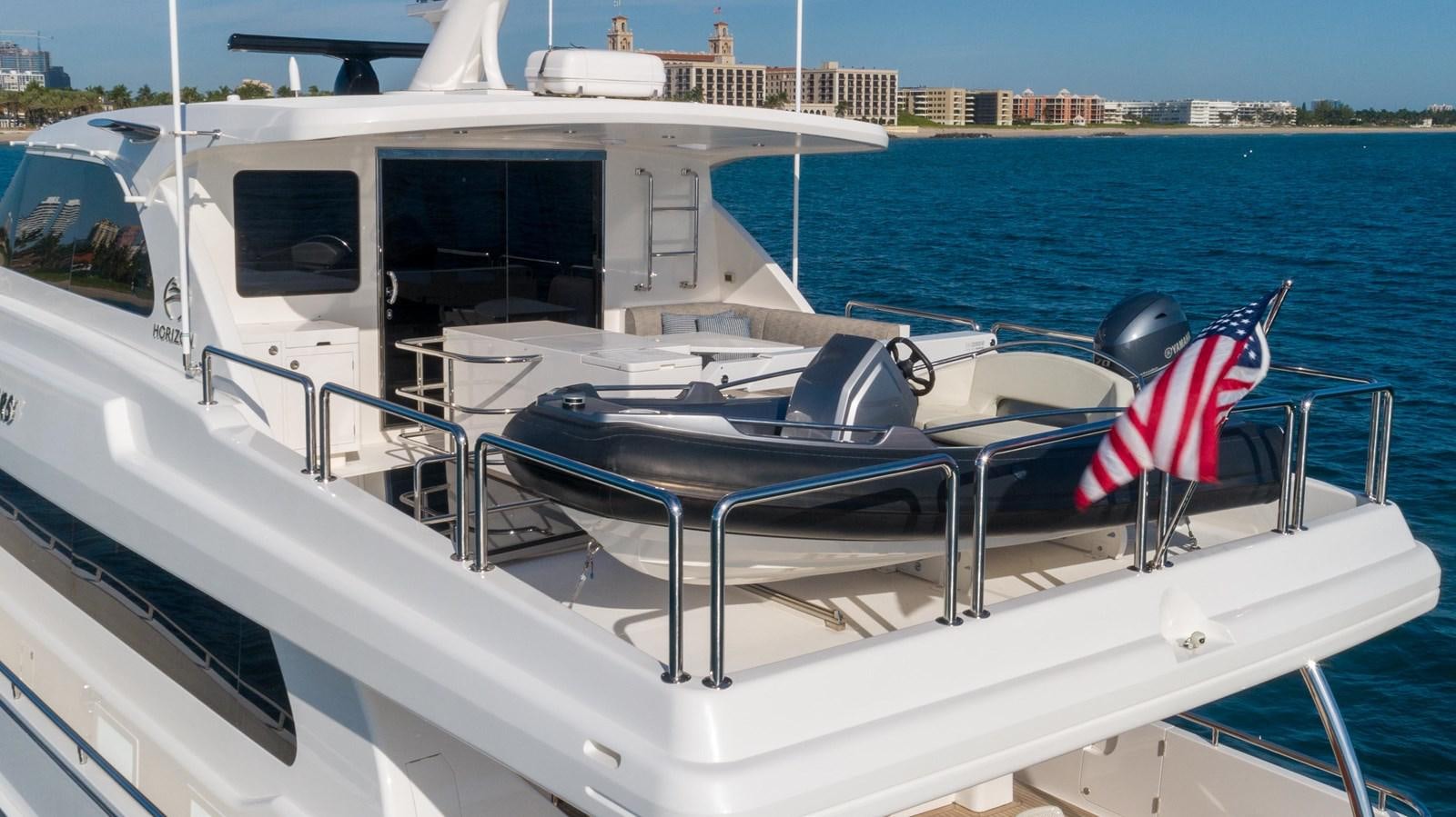 a boat with a flag on the front aboard SEA FAIRY Yacht for Sale