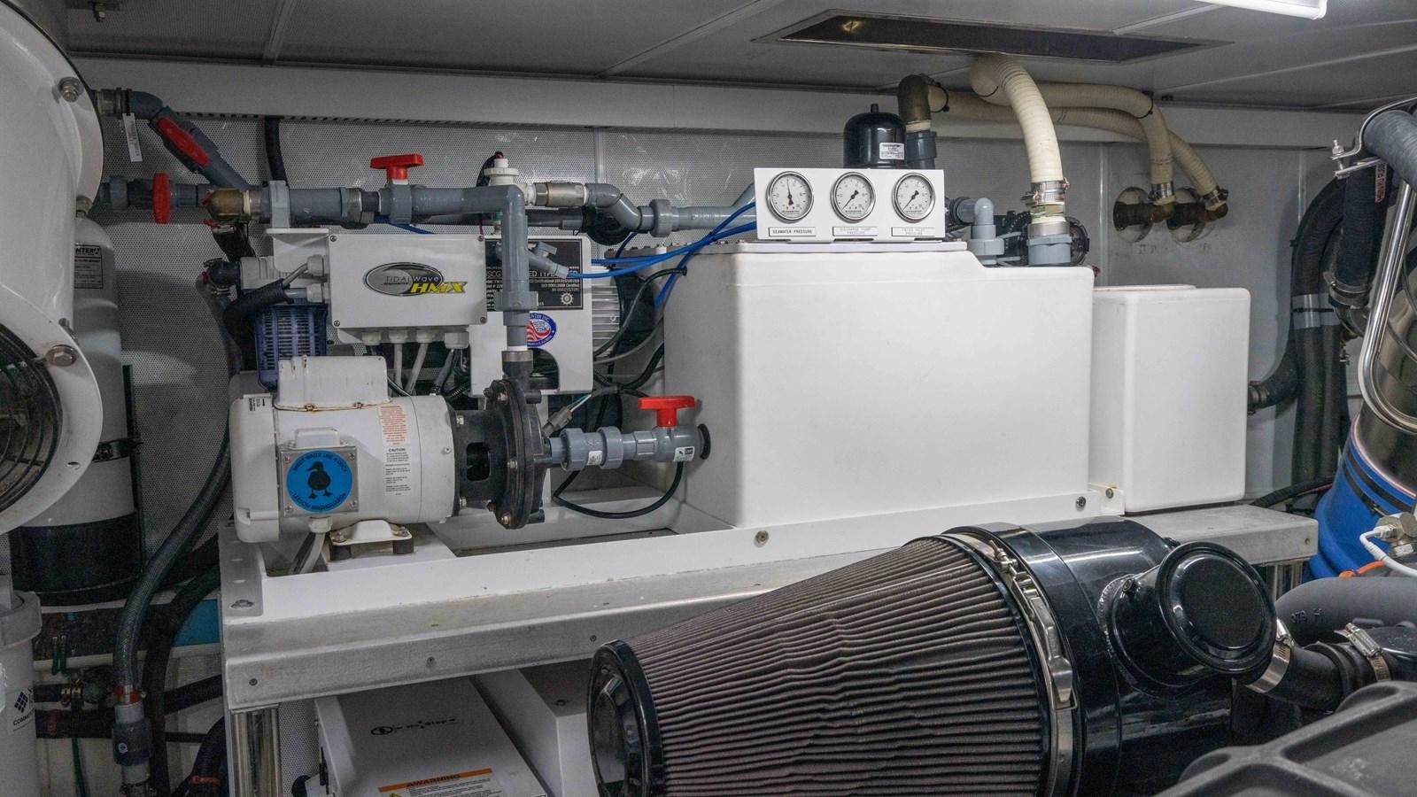 a machine with a large white object aboard SEA FAIRY Yacht for Sale